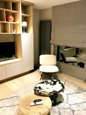 an empty room with a wooden floor and a door at Apartment with large terace next Jaillet ski area in Megève