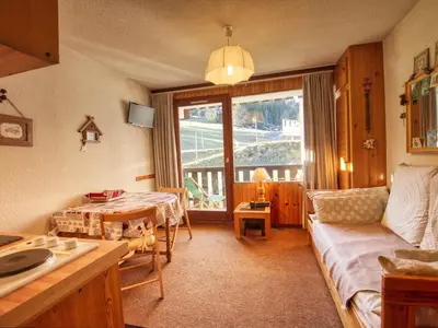 a living room with a couch and a table at Charmant studio 3 pers, vue pistes - FR-1-642-106 in Morillon