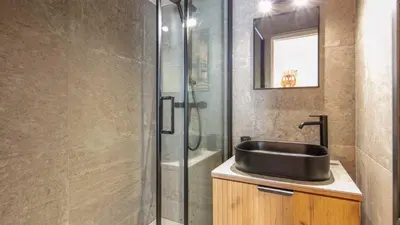 a bathroom with a sink and a shower at Grand Tetras N111 2P6 in Morillon