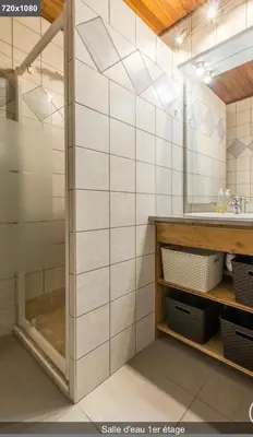 a bathroom with a shower and a sink at L'Arbaz in Samoëns