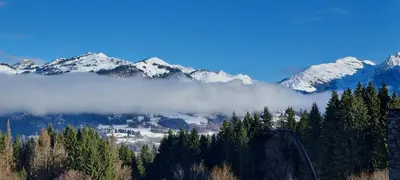 a view of a mountain range with snow covered mountains at Les Arcades N105 ST4 in Morillon