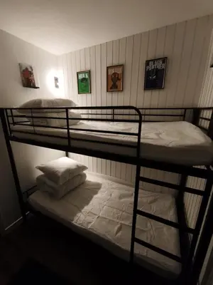 a couple of bunk beds in a room at Gamebox in Carroz in Les Carroz d'Araches