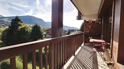 a balcony with a view of a mountain at 1 Sporting Acacia 2 - JAILLET - in Megève
