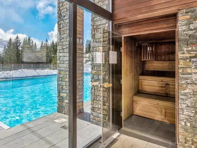 a bathroom with a shower and a swimming pool at Appartement 2 Pièces Pied des Pistes avec Wi-Fi et Parking - FR-1-687-120 in Arâches-la-Frasse
