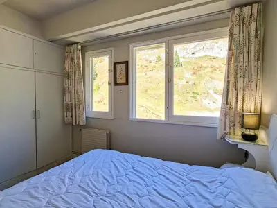 a living room with a couch and a table at Appartement spacieux, ski aux pieds, balcon, 3 pièces, 6-8 personnes - FR-1-425-238 in Arâches-la-Frasse