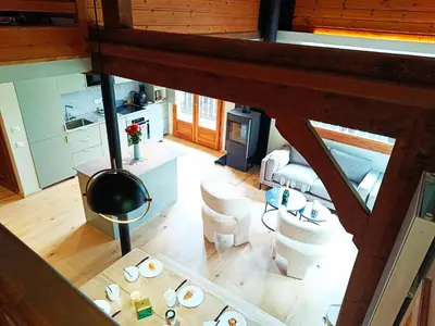 an overhead view of the living room and kitchen of a house at Le Cairn in Saint-Gervais-les-Bains