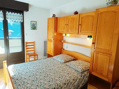 a small kitchen with a sink and a microwave at La Comtesse in Saint-Gervais-les-Bains