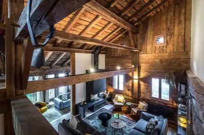 an overhead view of a living room with wooden walls at Rosaline Ferme 220m2 Charme Cheminee Jacuzzi Sauna in Les Houches