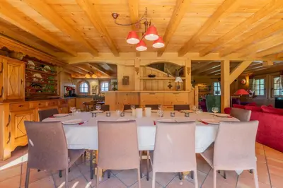 a large dining room with a table and chairs at Véroce Chalet Calme 10PAX Cheminee Vue in Saint-Gervais-les-Bains