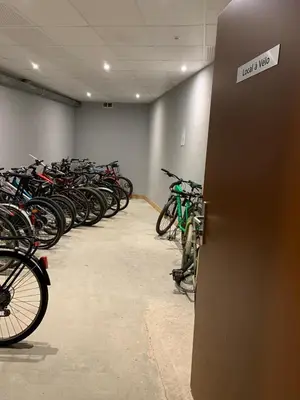 a bunch of bikes parked in a room at Grand Paradis B11 - Good location & parking in Chamonix-Mont-Blanc
