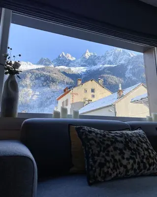 a window with a view of a mountain view at Chalet 7CH Groupes Centre-ville Sauna in Chamonix-Mont-Blanc
