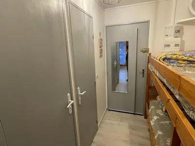 a room with a door leading to a bedroom at Studio cosy au centre de Samoëns pour 4 pers, animaux admis - FR-1-629-153 in Samoëns