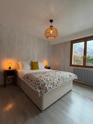 a wooden cabin with skis and ski equipment in it at Chalet d'Honneur in Chamonix-Mont-Blanc