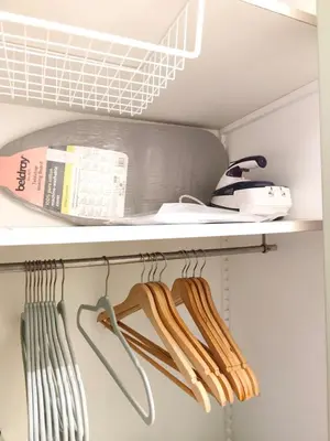 a closet with wooden utensils on a shelf at Le Nid d'Amélie Studio 4 people mountain view in Combloux