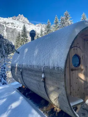 a dome shaped building with a snow covered roof at Marmotte Mountain Retreat in Chamonix-Mont-Blanc