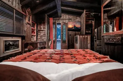 a bedroom with a large bed in a room at Chalet La Renarde in Chamonix-Mont-Blanc