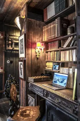 a room with a desk with a laptop on it at Chalet La Renarde in Chamonix-Mont-Blanc