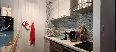 a kitchen with a sink and a counter top at Rochebrune, proche piste rr6171 in Megève