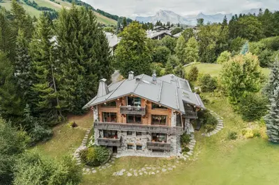 an overhead view of a house in the woods at Luxury Chalet Sauna Cinema Mont Blanc Views in Megeve in Megève
