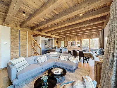 a living room with a couch and a table at Appartement élégant 4 chambres - Combloux, proche Mont-Blanc - FR-1-560-171 in Combloux