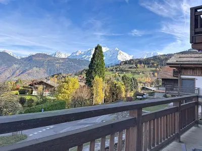 a balcony with a view of a mountain at Appartement élégant 4 chambres - Combloux, proche Mont-Blanc - FR-1-560-171 in Combloux