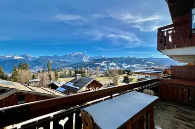a balcony with a view of the mountains at Stay in the mountains with stunning views in Combloux