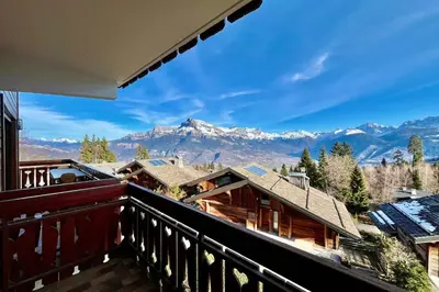 a balcony with a view of a mountain at Stay in the mountains with stunning views in Combloux