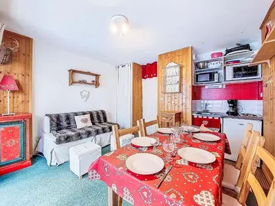 a dining room with a table and a window at Apartment Topaze-2 by Interhome in Saint-Gervais-les-Bains