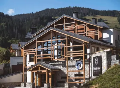 a house being constructed with wood at Veriaz - Appart 1 CH Cocon Design Confort in Megève
