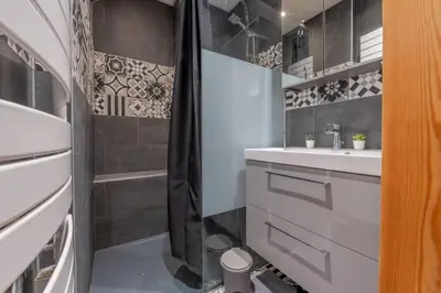 a bathroom with a sink and a shower at Straton - Cosy 1 CH Modern Hypercentre Transport 150m in Chamonix-Mont-Blanc