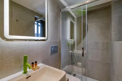 a bathroom with a sink and a shower at Modern Luxury Chalet BADI with Sauna - Happy Rentals in Chamonix-Mont-Blanc