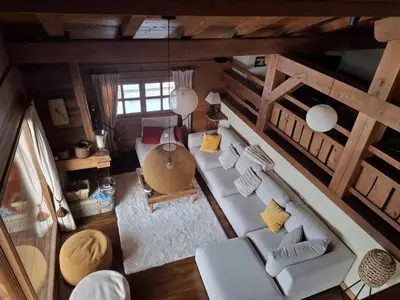 an overhead view of a living room with a couch at Chalet Grand Standing à Megève - 5 min des Pistes, 5 Chambres, 10 Pers. - FR-1-432-95 in Megève