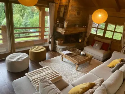 a living room with a couch and a fireplace at Chalet Grand Standing à Megève - 5 min des Pistes, 5 Chambres, 10 Pers. - FR-1-432-95 in Megève