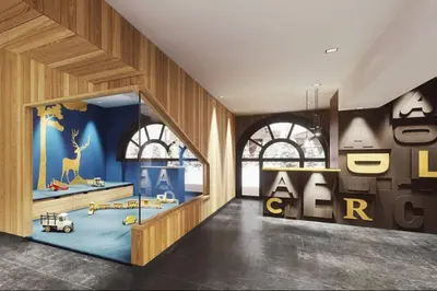 a room with a childrens room with a play area at Beautiful apartment in 5 stars residence with pool in Chamonix-Mont-Blanc