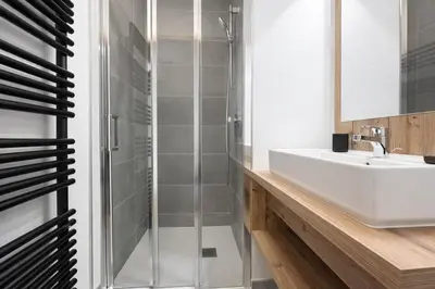 a bathroom with a sink and a shower at Les Sources de Canopee - Calme, Vue & Ski in Saint-Gervais-les-Bains