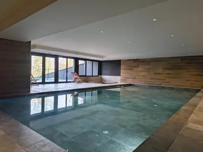 a swimming pool in a house at Les Sources de Canopee - Calme, Vue & Ski in Saint-Gervais-les-Bains