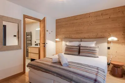 a kitchen with white cabinets and a white counter top at LAiguille Verte -Sejour familial - Grands Montets in Chamonix-Mont-Blanc