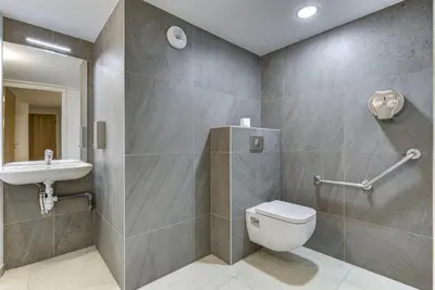 a bathroom with a toilet and a sink at Brume - 2CH 2SDB Vues Remontees 400m Garage SPA in Les Houches