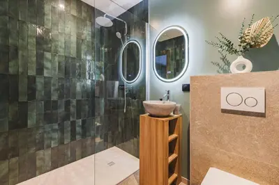 a bathroom with a sink and a shower at 7 Summits - Chalet 230m2 Salon Cathedrale Vues Cheminee in Les Houches