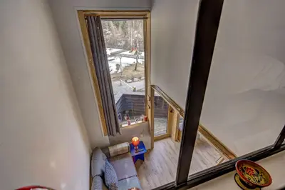 an overhead view of a living room with a large window at Fontanes - Duplex 200m Grands Montets Balcon Vue Parking in Chamonix-Mont-Blanc