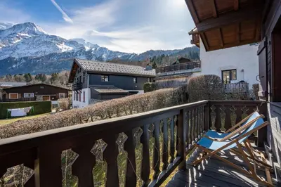 a balcony with a view of a mountain at Namaste - Cosy 2CH Vue Remontee 500m Parking in Les Houches