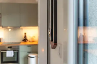 a close up of a refrigerator in a kitchen at Apartment Le Valleen in Saint-Gervais-les-Bains