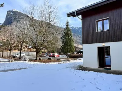 a bathroom with a sink and a shower at Appartement familial à Samoëns avec piscine et parking - FR-1-624-189 in Samoëns