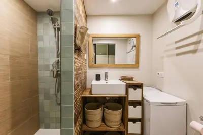 a bathroom with a sink and a shower at Petit Balcon - Cosy 1CH Remontees 500m Vue Parking Calme in Les Houches