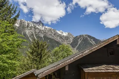 a view of the mountains from a cabin at Baribal - Charmant Mazot Terrasse Nature Vue Parking in Chamonix-Mont-Blanc