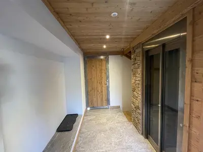 a hallway of a house with a wooden ceiling at Chalet Sablod in Les Contamines-Montjoie