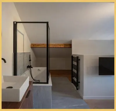 a bathroom with a sink and a mirror at Le Balcon du Mont-BIanc I Duplex I Combloux in Combloux
