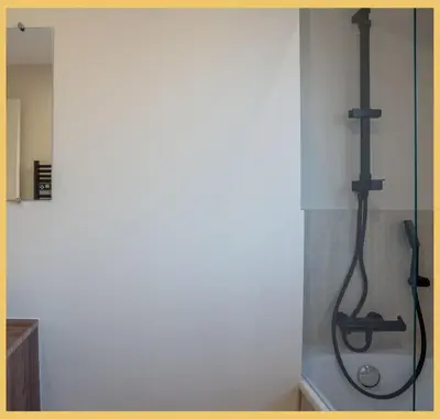 a shower in the corner of a bathroom at Le Balcon du Mont-BIanc I Duplex I Combloux in Combloux