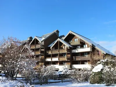 a large apartment building in the snow at Studio cosy avec balcon à Samoëns, parking inclus, pour 4 pers. - FR-1-815-114 in Samoëns