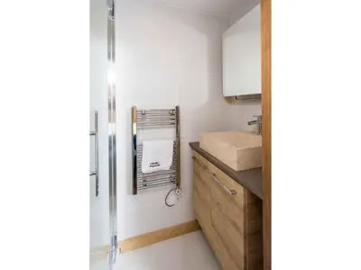 a small kitchen with a sink and a refrigerator at Apartment Ginabelle 8 Wohnung by Interhome in Chamonix-Mont-Blanc